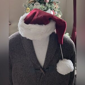 Santa’s red plush hat w/ white faux fur brim & pompon. NWT
